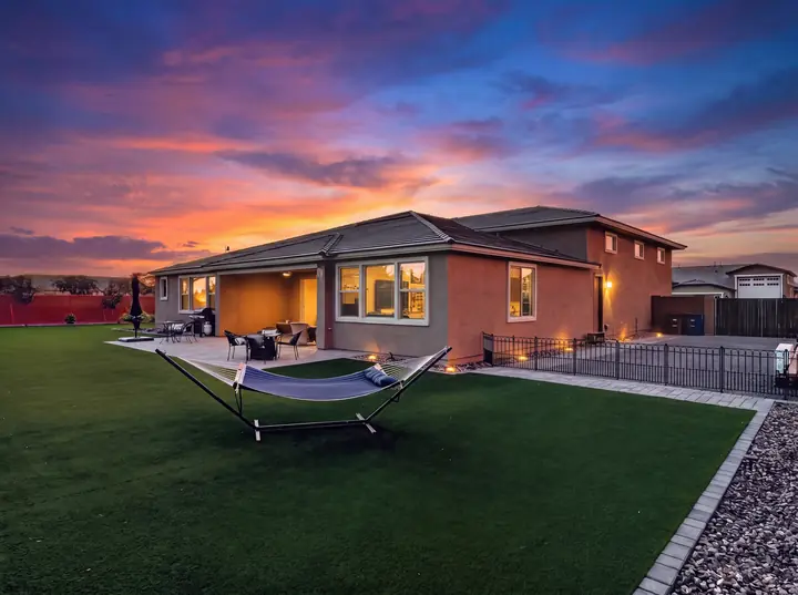 Family home backyard at twilight